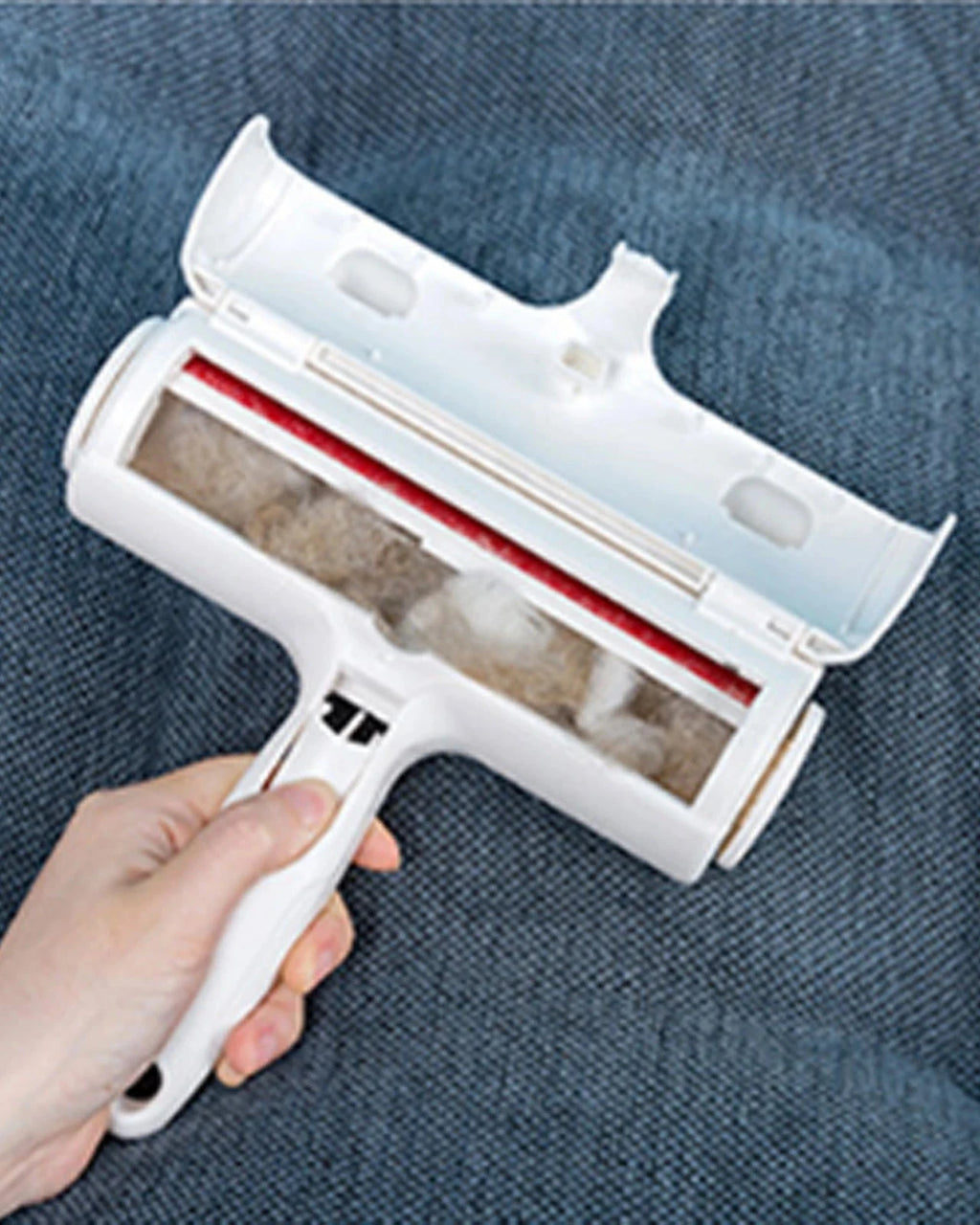 The Aftermath Hair Remover opened to show the collected fur inside