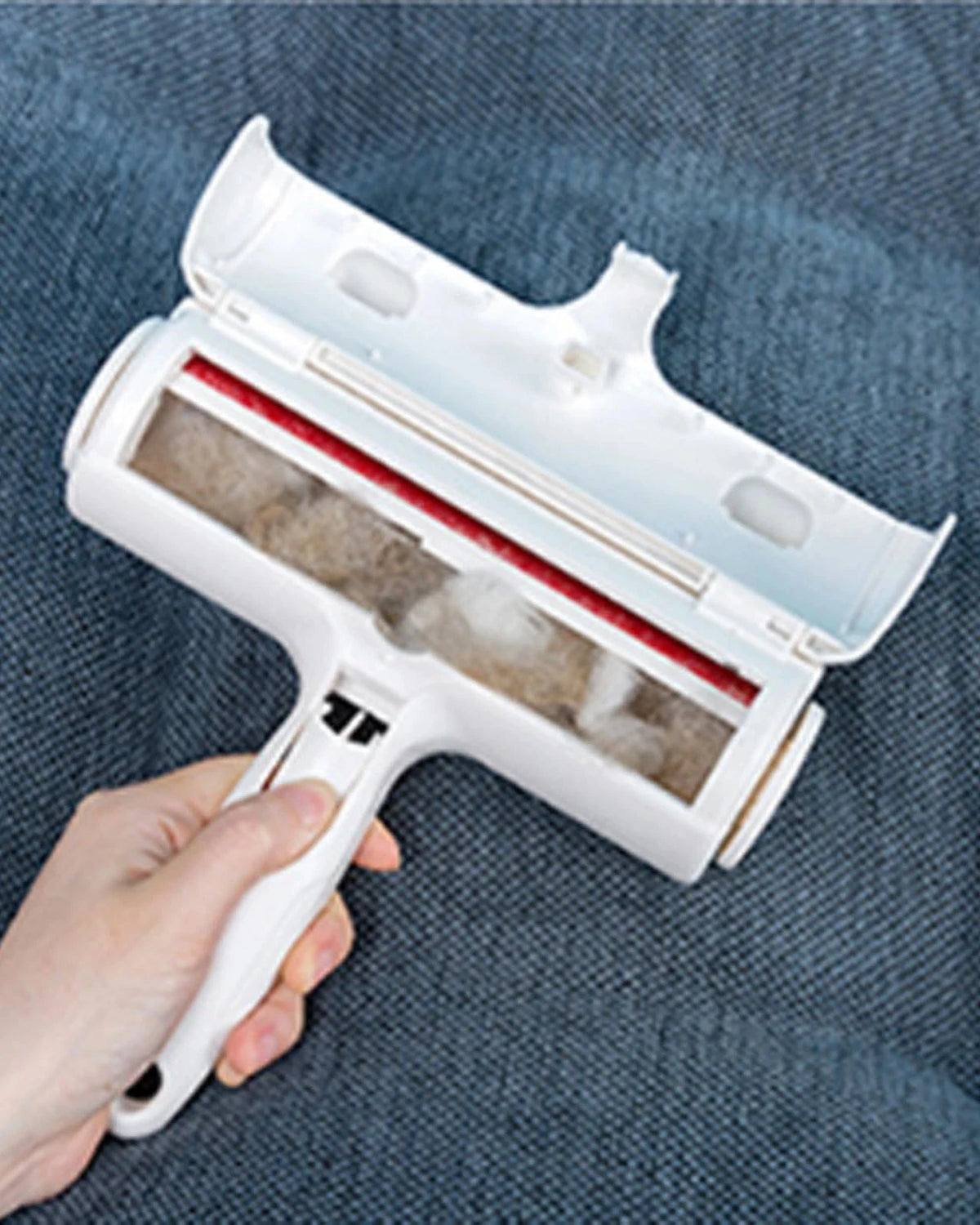 The Aftermath Hair Remover opened to show the collected fur inside