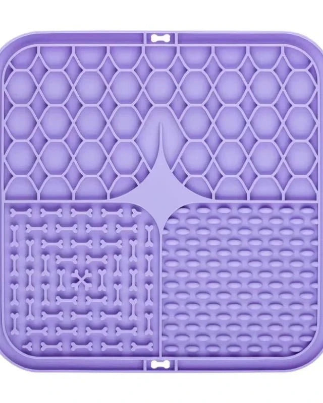The Slow Sunday Lick Mat in purple on a white background