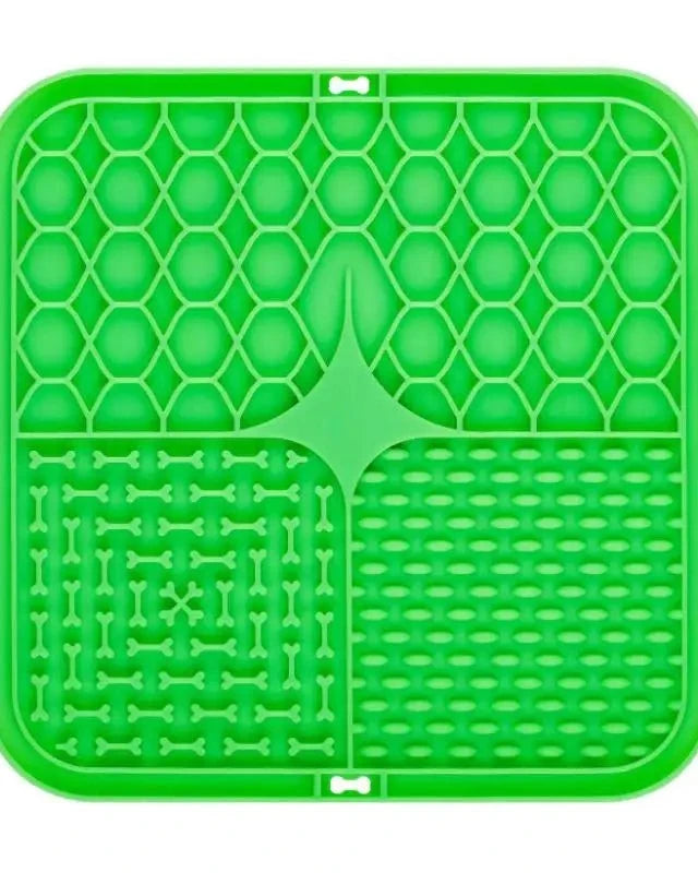 The Slow Sunday Lick Mat in green on a white background